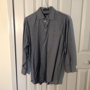 Like new, never worn. Black and gray checkered. Size 16 32/33.